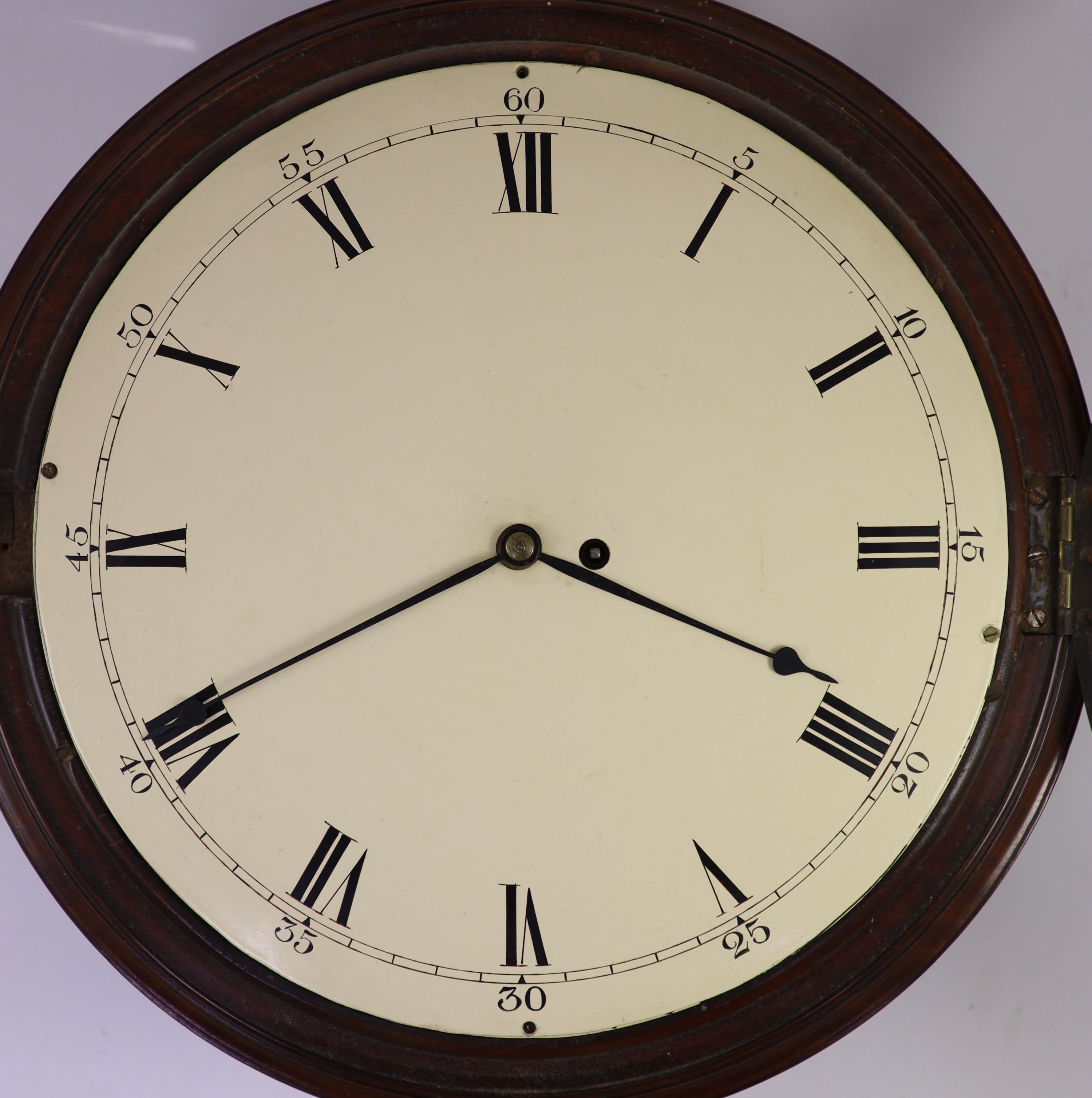 A late 18th century mahogany dial clock D 44cm.